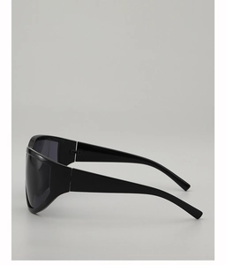 Side view of oversized black wrap-around shield sunglasses with sleek wide temples