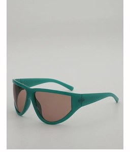 Detail of dark green oversized wrap sunglasses with a retro mask frame and tinted lenses