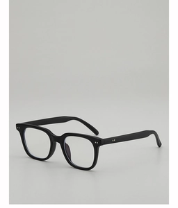 Detail view of black full-rim eyeglasses featuring stylish double round metal rivets