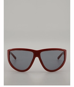 Front view of bold red oversized square sunglasses with dark lenses for a retro look