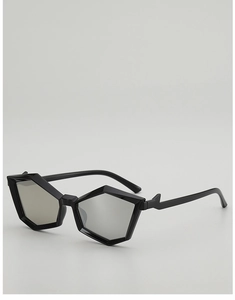 Detail view of punk style geometric black sunglasses with silver-gray lenses and angled arms