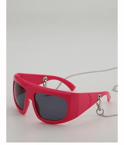 Detailed view of pink oversized Y2K sunglasses with a detachable silver metal chain