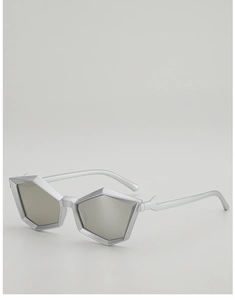 Detail of silver pentagonal geometric sunglasses with matte metal frame and hinges