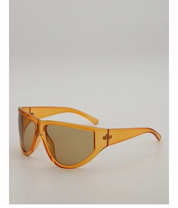 Detailed view of oversized orange frame sunglasses with dark lenses and metal hinges