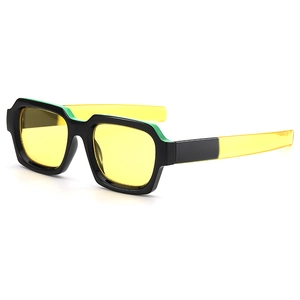 Square two-tone sunglasses with black and green frames and transparent yellow lenses