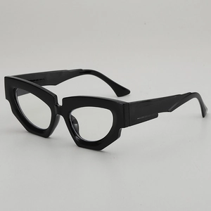 Irregular chunky black cat-eye sunglasses with thick geometric frames and UV protection