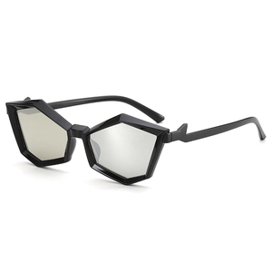 Futuristic polygon sunglasses with black geometric frame and silver semi-clear lenses