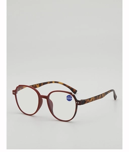 Detail of red retro round reading glasses showing +4.00 blue light blocking lens