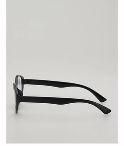 Detail view of black chunky frame glasses featuring wide temples and blue light lenses