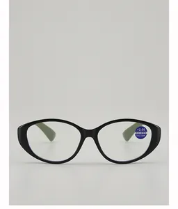 Detail of blue light blocking reading glasses with +2.00 strength and oval frame