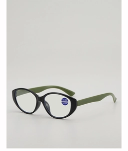 Cat eye reading glasses with anti-blue light lenses and green temples at 45-degree angle