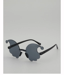 Close-up of novelty ghost shaped rimless sunglasses with wave edges for parties