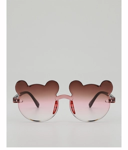 Detail of pink-brown gradient lenses with cute bear ear design on children's sunglasses