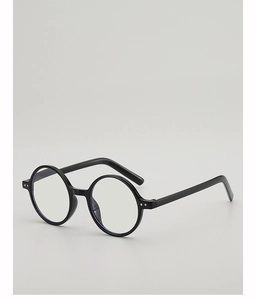 Detail view of round black eyeglass frames with silver rivet accents on the temples