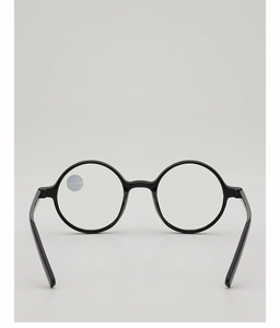 Detail of round black reading glasses with +2.50 magnification lens and retro frame