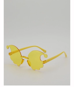 Detail of yellow wave-shaped rimless funny glasses for party photo props and costume