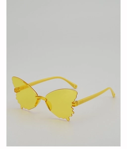 Detail view of yellow butterfly-shaped rimless sunglasses for kids with stylish design