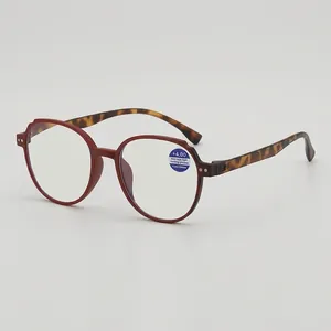 Fashionable anti-blue light reading glasses with dark red round frames and tortoise temples