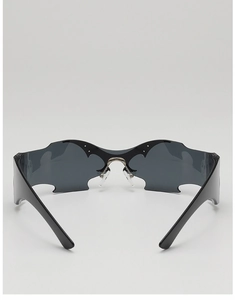 Detailed top view of black bat wing sunglasses with a futuristic punk and gothic aesthetic