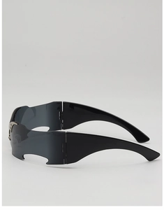 Detail of Y2K rimless sunglasses with rhinestone silver trim and dark grey wrap lenses