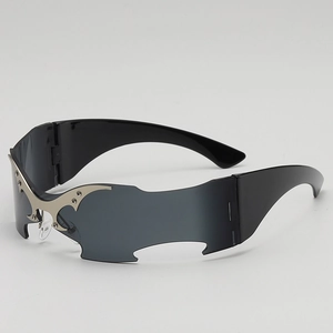 Futuristic punk sunglasses with frameless bat wing design and silver flame accents