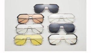 Detail view showing collection of large frame geometric sunglasses in various lens colors