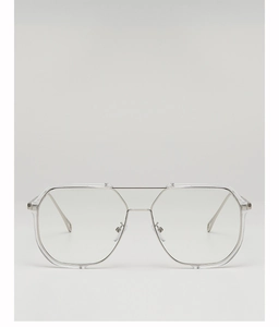 Detailed close-up of a silver metal nose bridge and clear hexagonal frames on sunglasses
