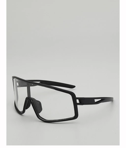 Detail view of transparent cycling glasses with adjustable nose pads and black frame