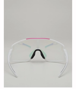 Detailed front view of white cycling glasses with pink accents and adjustable nose pads