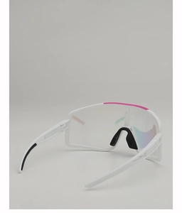 Detailed view of adjustable black nose pads and pink trim on cycling sunglasses