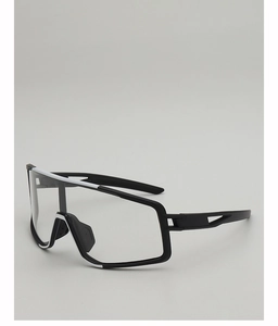 Detail view of lightweight cycling glasses featuring clear lenses and black and white frame