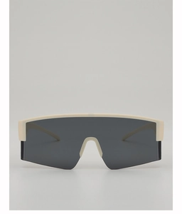 Frontansicht der cremefarbenen Oversize-Radbrille mit dunkelgrauen Monogläsern