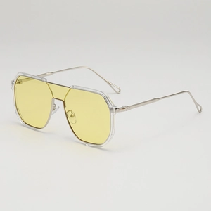 Classic oversized sunglasses with yellow lenses, clear frames and silver metal temples