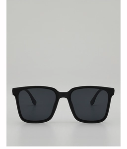Front view of minimalist black square sunglasses with UV400 lenses on gray background