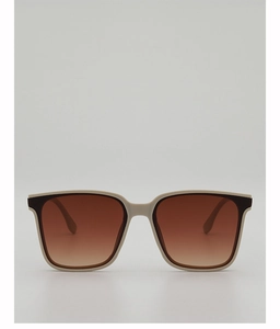 Detail of square beige frame sunglasses with brown gradient lenses and color-block accents