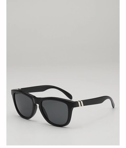 Detail of black sporty sunglasses with stylish silver triple-stripe accents on the temple