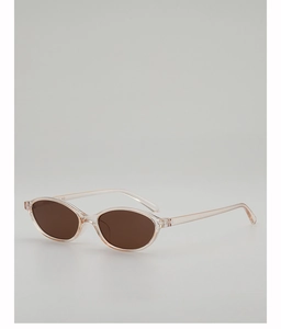 Detailansicht der ovalen Retro-Sonnenbrille mit pfirsichfarbenem Rahmen und Gläsern