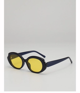 Detailed side view of oval sunglasses featuring dark glossy frames and yellow lenses