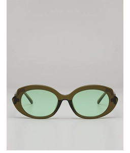 Macro view of olive green oval sunglasses with translucent frame and tinted lenses