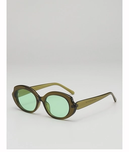 Detail view of oval sunglasses showing translucent frame and model number SH3355