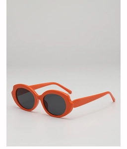 Detailed view of irregular wavy oval frame in bright orange with dark grey lenses