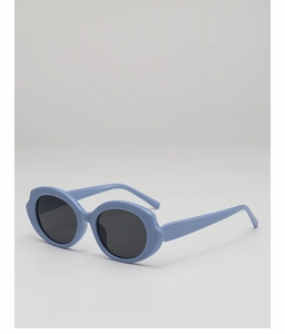 Close-up of light blue wave frame sunglasses with dark lenses for a retro chic look