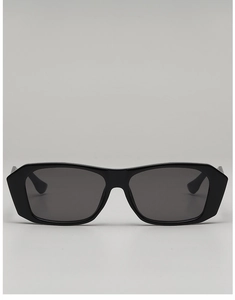Front view of vintage black square sunglasses with thick frames and dark UV lenses