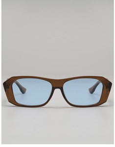 Detail of vintage square sunglasses with translucent brown frames and light blue lenses