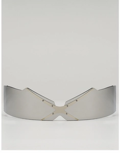 Detail of silver futuristic goggles featuring industrial X-shaped metal bridge and screws