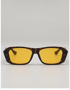 Detail of tortoise shell square sunglasses frame with translucent yellow lenses