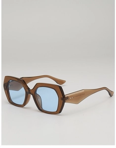 Detail shot of blue lenses and brown polygonal frames with size markings on temple