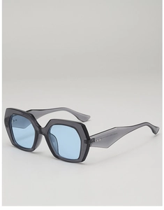 Close-up of translucent grey acetate sunglasses frame with light blue lenses and hinges