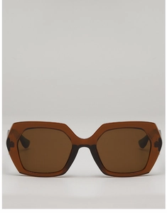Detailed front view of oversized geometric brown sunglasses with stylish resin frame