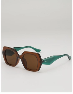 Detail of oversized geometric sunglasses with tea-brown frame and turquoise temple tips